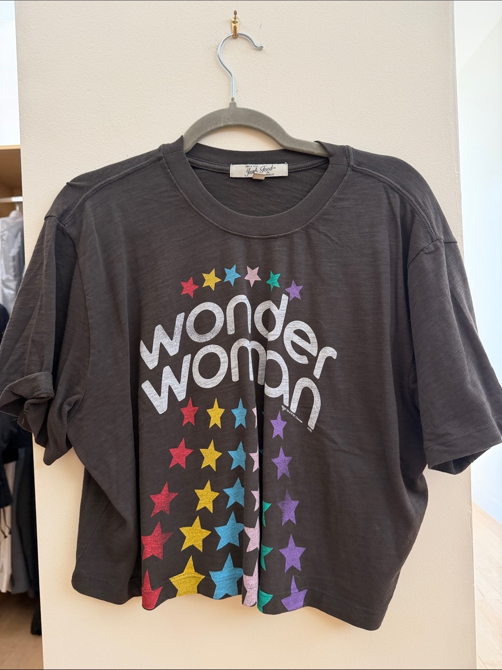 Junk Food Clothing Black Wonder Woman Graphic Tee with Multicolor Stars